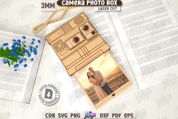 Caja de fotos con forma de cámara